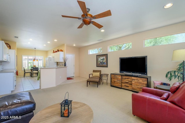 19607 N Flint Way, Surprise, AZ 85374 - living room with a ceiling fan, recessed lighting, and light carpet