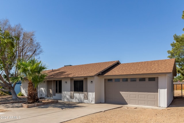 single story home featuring a garage