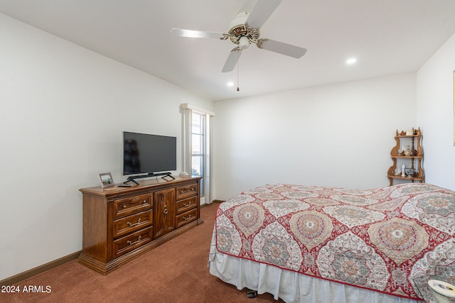 bedroom with ceiling fan and carpet floors