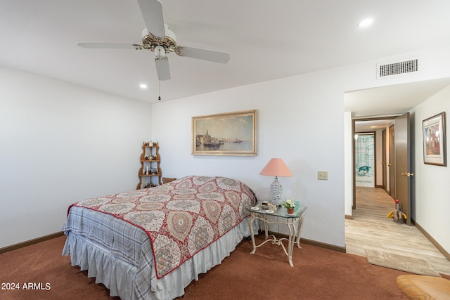 carpeted bedroom featuring ceiling fan