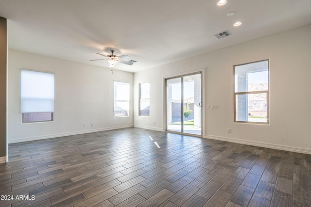 unfurnished room with ceiling fan