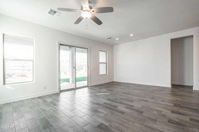 unfurnished room with ceiling fan