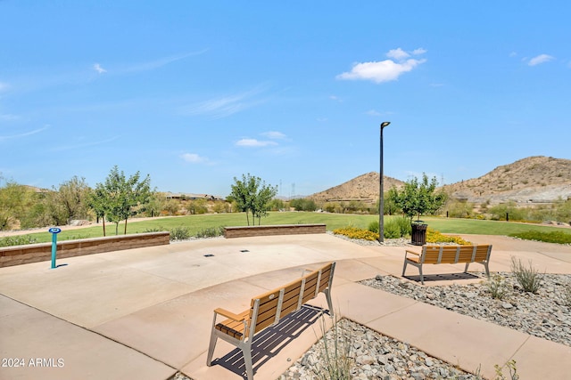 view of patio / terrace featuring a mountain view