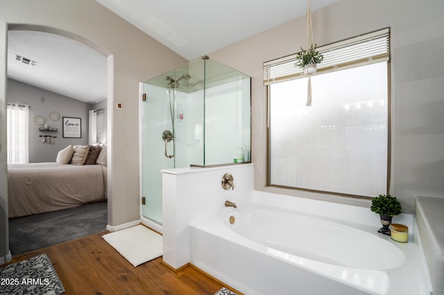 full bathroom with a garden tub, visible vents, a stall shower, wood finished floors, and ensuite bathroom