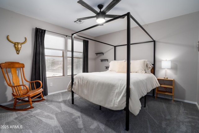 bedroom featuring carpet flooring, baseboards, visible vents, and ceiling fan