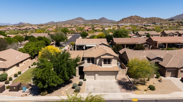 bird's eye view with a residential view and a mountain view