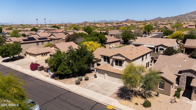 bird's eye view with a residential view and a mountain view