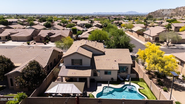 aerial view featuring a mountain view and a residential view