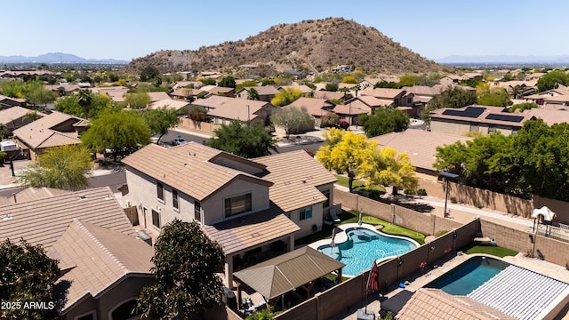 bird's eye view with a residential view and a mountain view