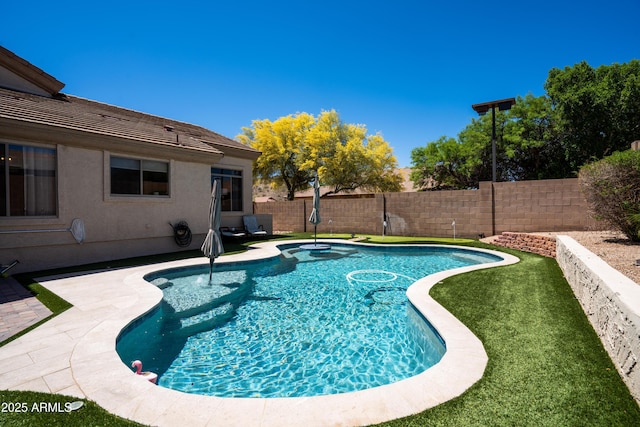 view of pool with a fenced backyard, a fenced in pool, and a patio area