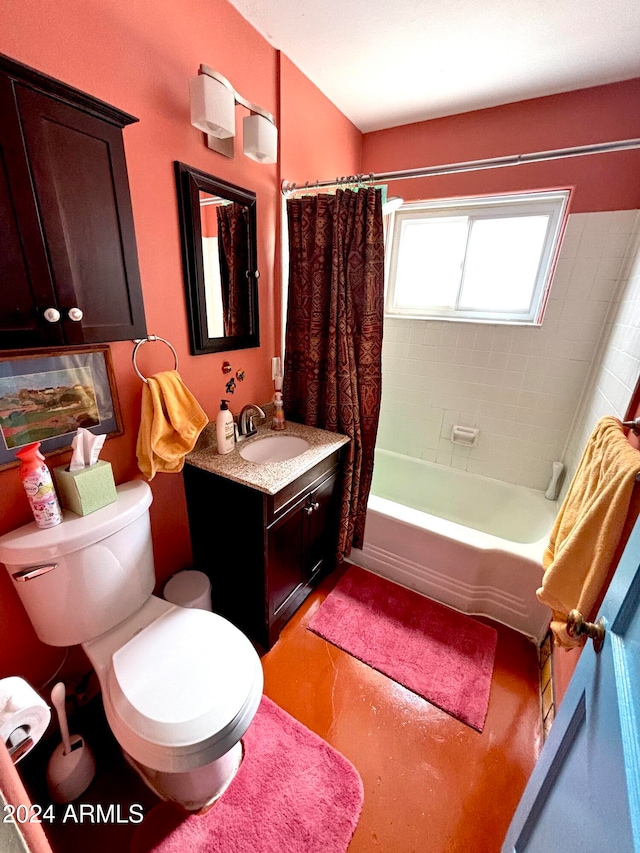 full bathroom with shower / bath combo, vanity, and toilet