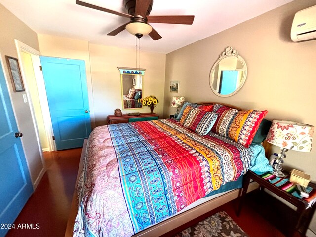 bedroom with ceiling fan and a wall mounted AC