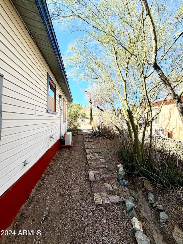 view of property exterior with cooling unit