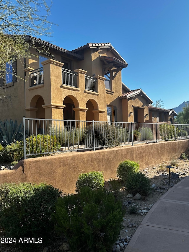 exterior space featuring a balcony