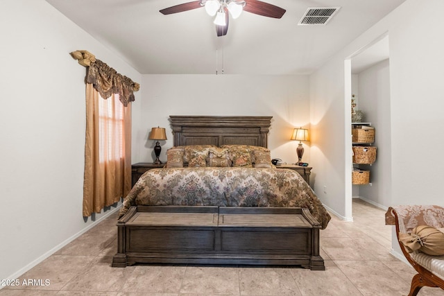 bedroom featuring ceiling fan and light tile patterned flooring