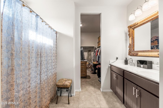 bathroom featuring tile patterned floors and vanity