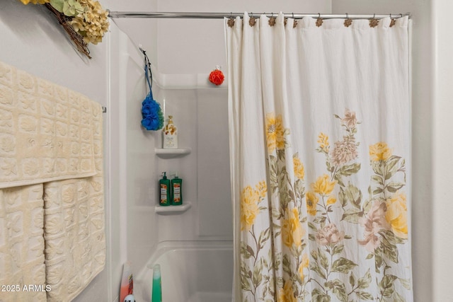 bathroom with a shower with shower curtain