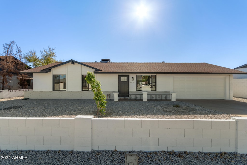 view of front of property featuring a garage