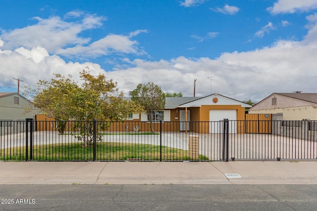 view of front of property featuring an attached garage, driveway, a fenced front yard, and stucco siding