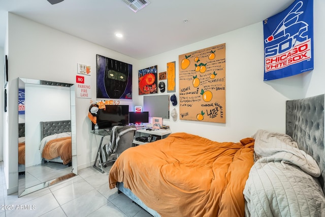 bedroom featuring tile patterned flooring and visible vents