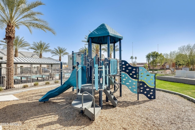 community playground featuring fence