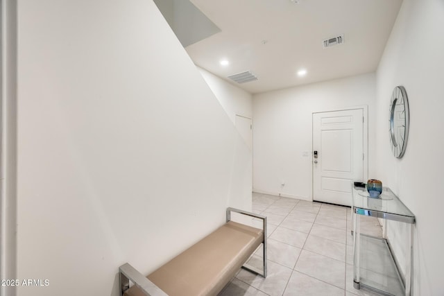 foyer entrance featuring light tile patterned flooring, visible vents, and recessed lighting