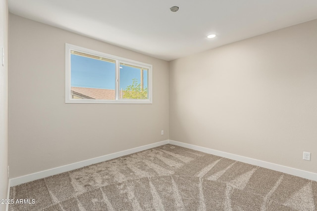 spare room with carpet flooring