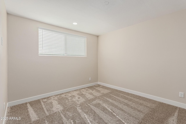 view of carpeted spare room