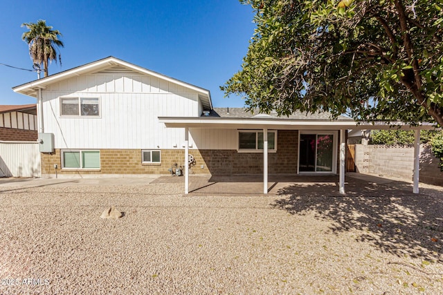 rear view of house with a patio area