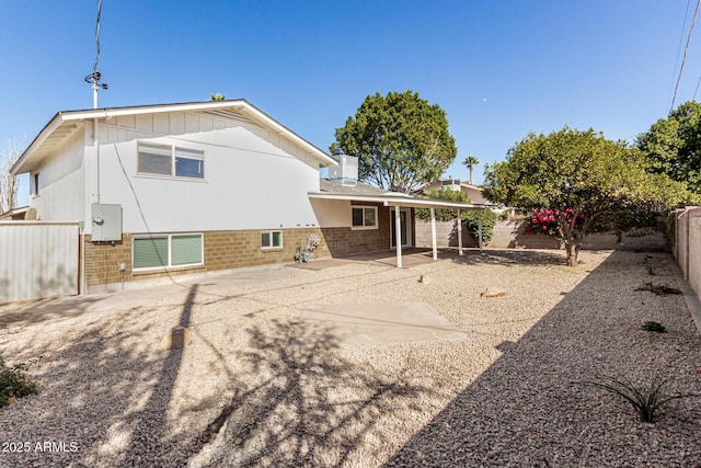 back of property with a patio area