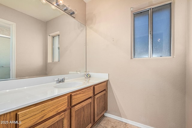 8566 N 108th Ln, Peoria, AZ 85345 - full bathroom with vanity, plenty of natural light, and tile patterned flooring