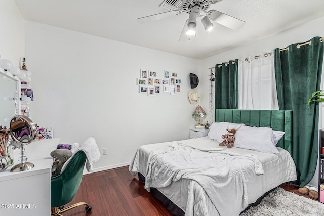 8566 N 108th Ln, Peoria, AZ 85345 - bedroom featuring wood finished floors and a ceiling fan