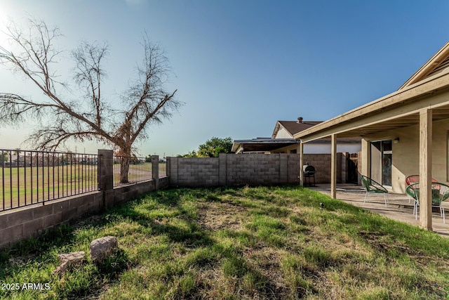 8566 N 108th Ln, Peoria, AZ 85345 - fenced backyard featuring a patio