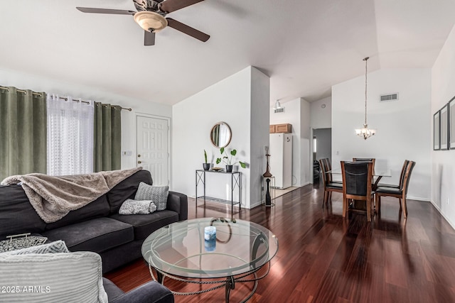 8566 N 108th Ln, Peoria, AZ 85345 - living area with a chandelier, ceiling fan, dark wood-style flooring, and high vaulted ceiling