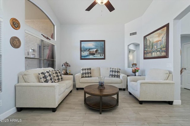 living room featuring ceiling fan