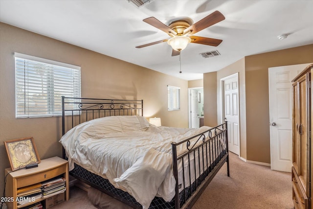 bedroom with light colored carpet and ceiling fan