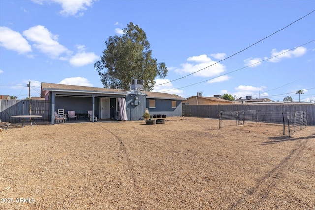 back of property with cooling unit