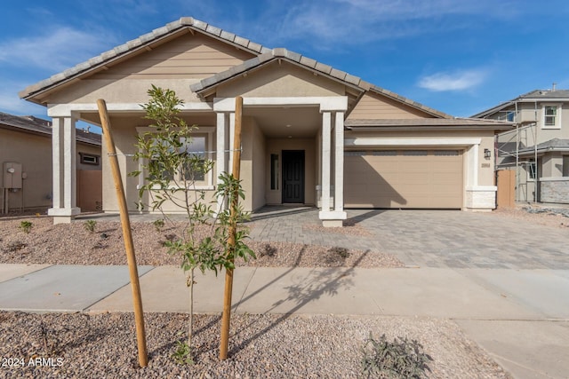 view of front of property featuring a garage