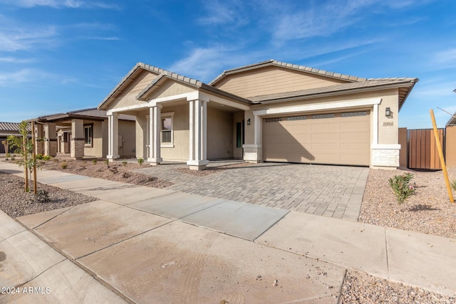 view of front of property featuring a garage