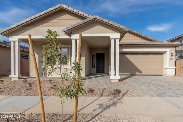 view of front of property featuring a garage