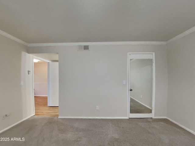 16635 N Cave Creek Rd Unit 232, Phoenix, AZ 85032 - carpeted empty room with visible vents, baseboards, and crown molding