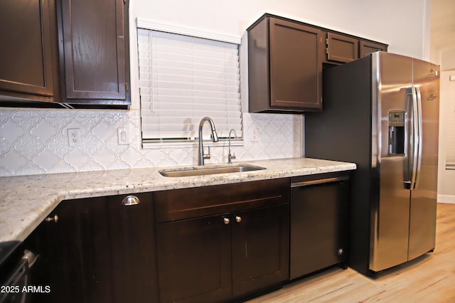 5941 W Venus Way, Chandler, AZ 85226 - kitchen with a sink, dishwashing machine, light wood finished floors, and dark brown cabinets