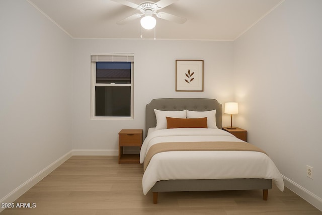 5941 W Venus Way, Chandler, AZ 85226 - bedroom with light wood-style flooring, ornamental molding, baseboards, and ceiling fan