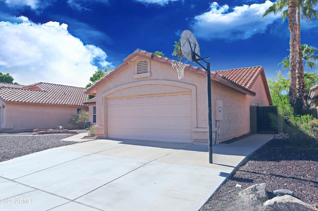 5941 W Venus Way, Chandler, AZ 85226 - view of front of home with a tile roof, an attached garage, stucco siding, and concrete driveway