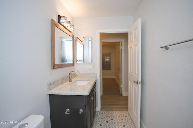 5941 W Venus Way, Chandler, AZ 85226 - half bath with vanity, toilet, and baseboards