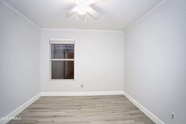 5941 W Venus Way, Chandler, AZ 85226 - unfurnished room featuring a ceiling fan, baseboards, wood finished floors, and crown molding