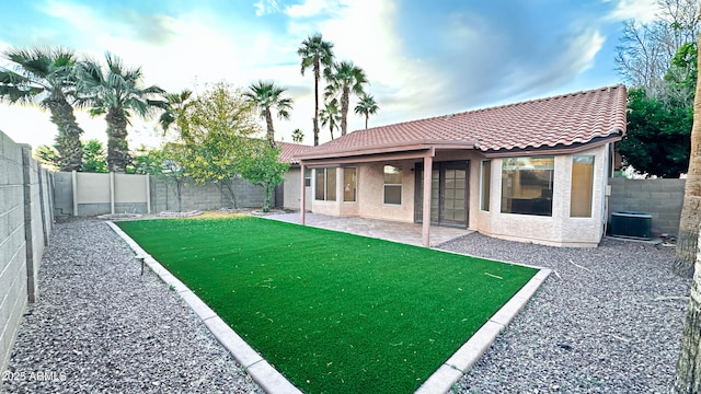 5941 W Venus Way, Chandler, AZ 85226 - rear view of property featuring a tiled roof, central AC unit, a patio, and stucco siding