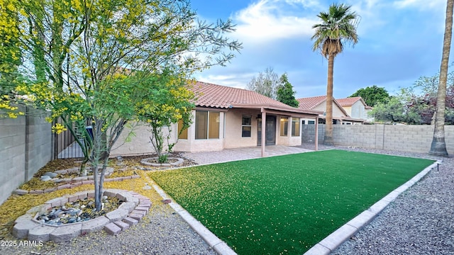 5941 W Venus Way, Chandler, AZ 85226 - rear view of house featuring a tiled roof, stucco siding, and a patio area
