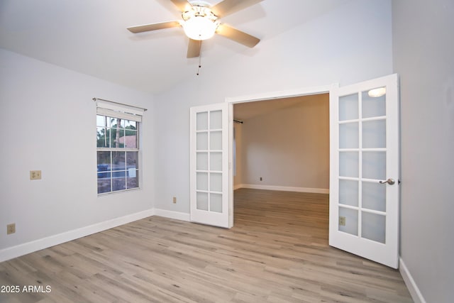 5941 W Venus Way, Chandler, AZ 85226 - unfurnished room featuring french doors, wood finished floors, vaulted ceiling, a ceiling fan, and baseboards