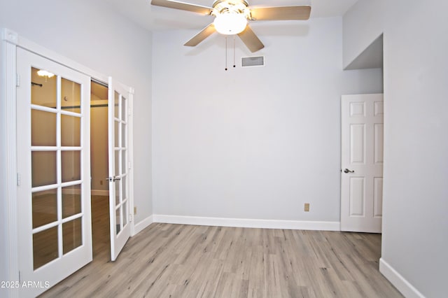 5941 W Venus Way, Chandler, AZ 85226 - spare room with french doors, wood finished floors, baseboards, and a ceiling fan